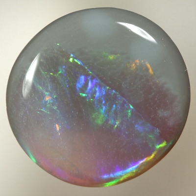 SOLID SEMI BLACK OPAL Flame pattern of orange, green and blue